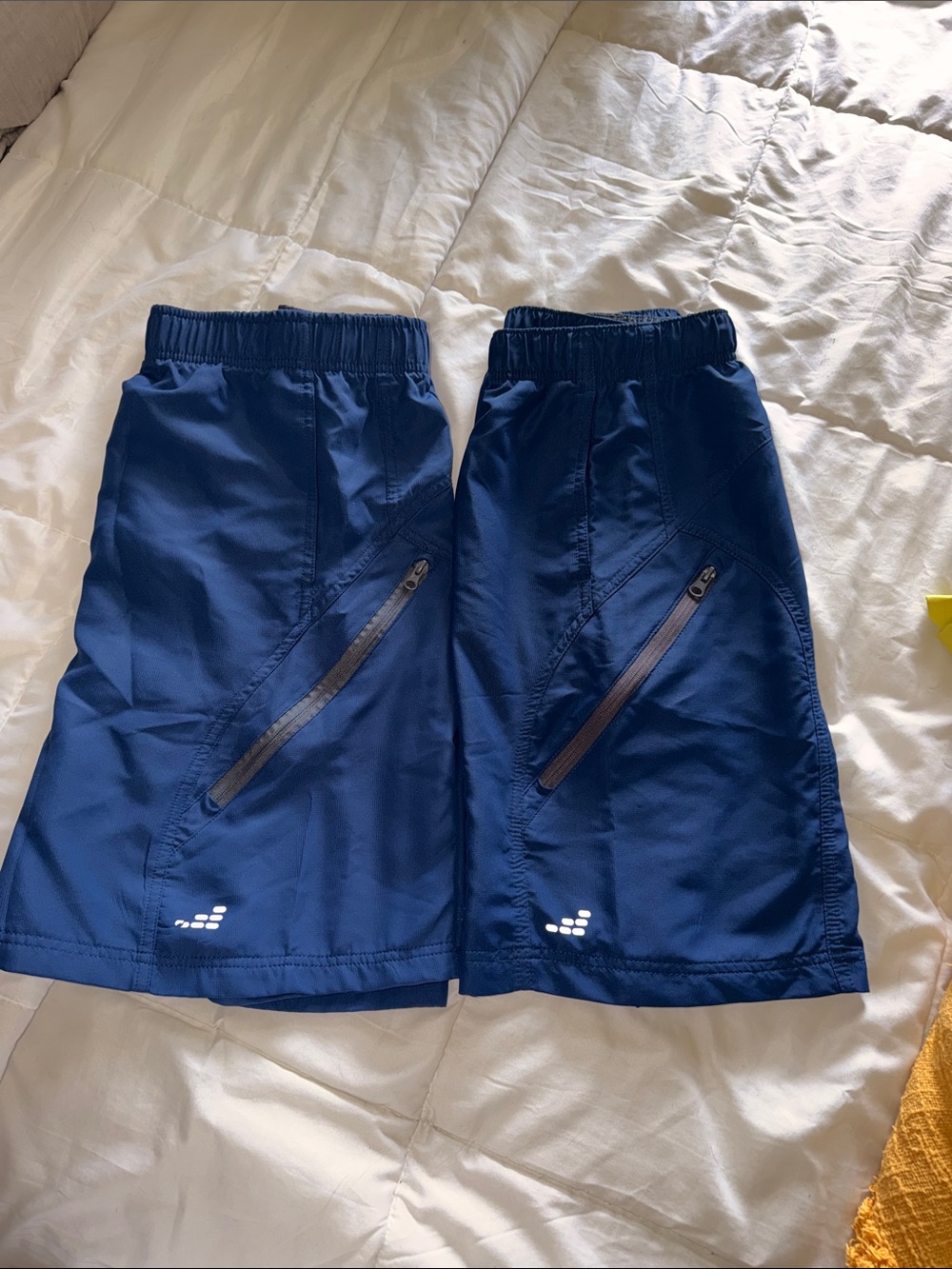 2 pair of Men’s BCG navy blue drawstring shorts size large w/ zipper pocket